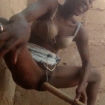 A very horny village girl masturbates with a wooden stick