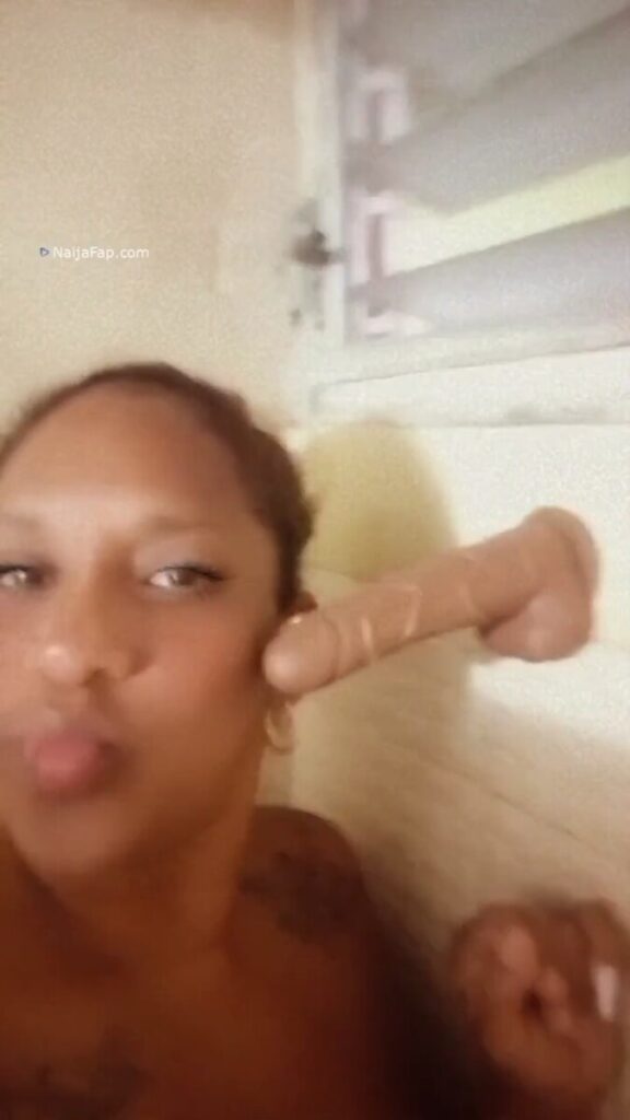 Woman Sucking Her Big Dildo