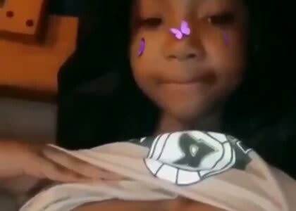 Coloured Babe With Huge Boobs on Camera